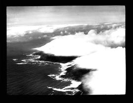 Aerial view of clouds at the coastline.