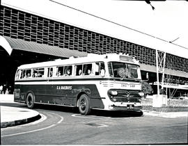 "Johannesburg, 1965. SAR Nissan MT16958 Nissan motor coach at station."