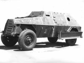
Four-wheeled armoured vehicle.
