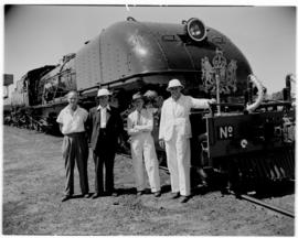 Livingstone, Northern Rhodesia, 11 April 1947. Rhodesian Railways staff in front of a RR Class 15...