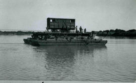 Upington, 1915. SAR cattle wagon Type I-10 on pontoon crossing the Orange River.