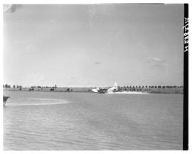 Vaal Dam, May 1948. Arrival of BOAC Solent flying boat G-AHIN 'Southampton'. Aircraft touching down.