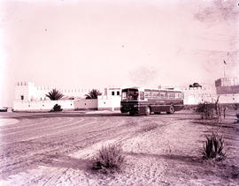 Etosha Game Park, South-West Africa, 1966. SAR Mercedes Benz tour bus No MT16404 at Fort Namutoni...