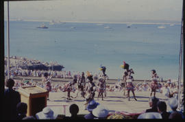 Traditional dancers at harbour.