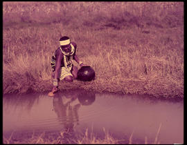 Melmoth district. Zulu girl fetching water at Nkandla.
