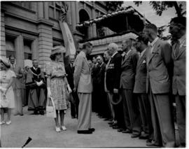 Umtata, 5 March 1947. King George VI and Princess Elizabeth greeting ex-servicemen outside the to...
