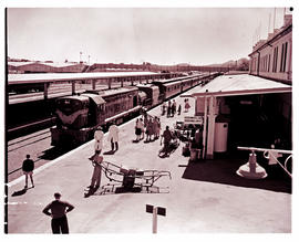 Windhoek, South-West Africa, 1961. SAR Class 32-000 No 32-048 with passenger train at railway sta...