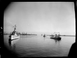 Cape Town, 17 February 1947. 'HMS Vanguard' entering Table Bay with SAR tugs in attendance.