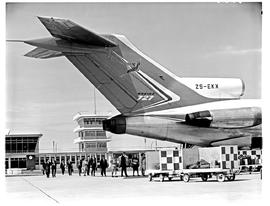 East London, 1968. Ben Schoeman airport. SAA Boeing 727 ZS-EKX 'Swakop'. Passengers walking towar...