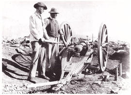 Circa 1900. Anglo-Boer War. Two men at cannon.