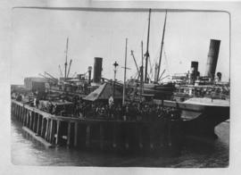 Cape Town, 22 January 1902. Ship at large wooden jetty in Table Bay Harbour.
