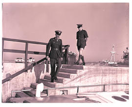 Durban, July 1974. Water police on steps in Durban Harbour.
