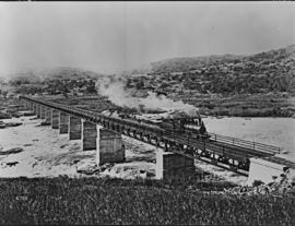 Eshowe district. Zululand Railways 2-6-0 built by Baldwin with construction train on the Tugela R...