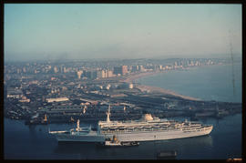 Durban, July 1968. SAR tug escorting Italian passenger ship into Durban Harbour. [HH Kruger]