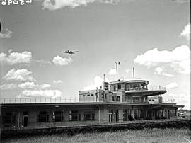 Johannesburg, 1938. Rand airport. SAA Junkers Ju-86 in flight over terminal building.