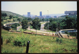 Pretoria, 1991. Blue Train leaving past the main UNISA campus.