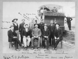 Pretoria, 1902. Station staff at Pretoria West station with NZASM 18 tonner Class in the background.