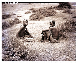 Transkei, 1940. Two males sitting.