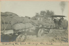 Brandfort district. SAR tractor on a muddy section drawing its load of trailers.