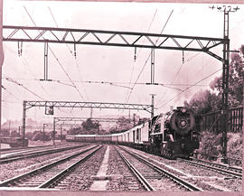 Johannesburg, 1939. SAR Class 23 with the new air-conditioned Union Express approaching  Johannes...