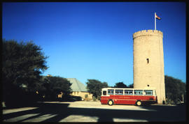 Etosha Game Park, South-West Africa, 1975. SAR Mercedes Benz tour bus at lookout tower in Okaukue...