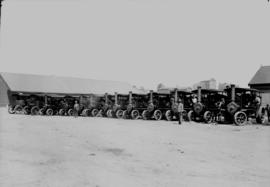 Johannesburg, 1923. Thirteen tractors parked at Kazerne. Two Sentinel tractors on the far left. T...