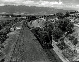 Tulbagh district, 1950. SAR Class 15F with main line passenger train leaving Tulbagh Road station.