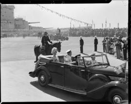 Cape Town, 17 February 1947. King George VI and Queen Elizabeth leaving Table Bay Harbour in open...