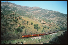 Tulbagh district, 1982. Three SAR Class 5E's with Trans-Karoo passenger train in Tulbaghkloof.