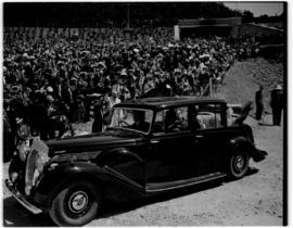 East London, 3 March 1947. Royal couple in Daimler bearing the Royal party at the opening and nam...