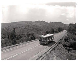 Grahamstown district, 1970. SAR Mercedes Benz tour bus on open road.