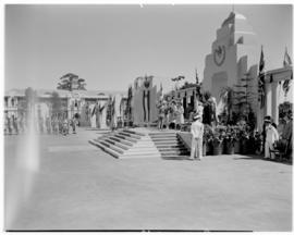 Bulawayo, Southern Rhodesia, 15 April 1947. King George VI waves to the crowd from dais.