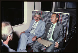 Seated in Metroblitz train: Minister Hendrik Schoeman and Mr Bart Grove.