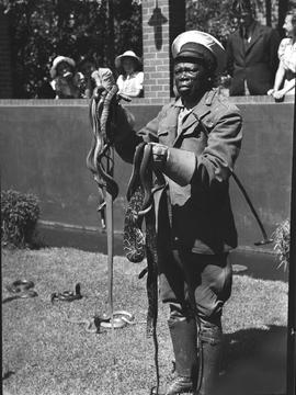 Port Elizabeth, 1940. Snake park with snake handler Johannes Molikoe.