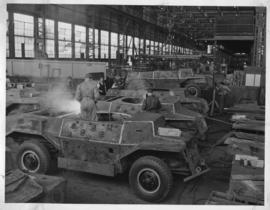 Circa 1940. Armoured military vehicle being constructed in SAR workshops during Second World War.