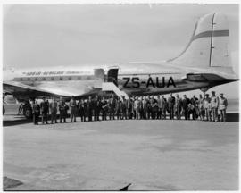 Johannesburg, May 1946. Palmietfontein Airport. Passengers and crew at return of SAA Douglas DC-4...