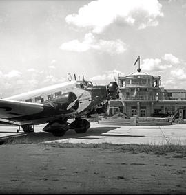 Johannesburg, 1935. Rand airport. SAA Junkers Ju-52 ZS-AFD 'Sir Benjamin D’Urban' in foreground w...