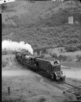 Waterval-Onder, 1965. Passenger train headed by SAR Class GMA crossing bridge on curve.