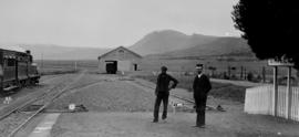 Bailey, 1895. Train and locomotive shed with two railwaymen posing. (EH Short)