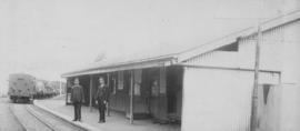 Dohne, 1895. Two railwaymen posing in front of corrugated iron station building. (EH Short)