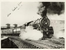 Johannesburg, 1936. SAR Class 16E No 858 with Union Limited departing from station.