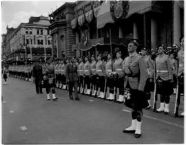 Johannesburg, 1 April 1947. King George VI inspecting Scottish regiment in front of the city hall.