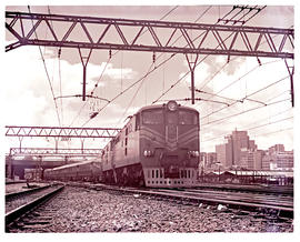 "Johannesburg, 1961. Two SAR Class 5E's with Blue Train leaving station."