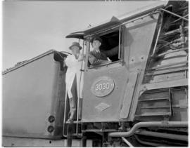 21 February 1947. SAR Class 15F No 3030 with driver Mr Kruger and locomotive inspector.