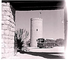 Etosha Game Park, South-West Africa, 1971. SAR Mercedes Benz tour bus No MT16402 at Fort Namutoni...