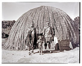 Natal, 1946. Zulu family in front of hut.