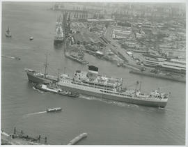 Durban, 1965. The 'City of Exeter' and tug entering Durban Harbour.