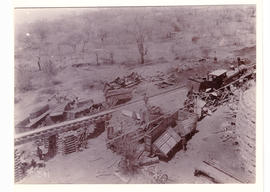 Kaapmuiden, circa 1900. Damaged wagons next to timber trestle bridge diversion during Anglo-Boer ...