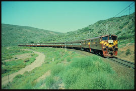 De Doorns district, 1981. SAR Class 5E1 Srs 1 on 202up 'Trans-Karoo' passenger train approaching ...