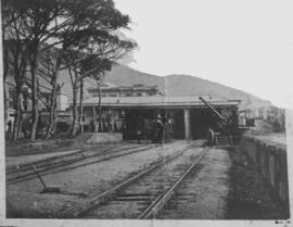 Cape Town. Main station with broad gauge tracks. Hand crane on left.